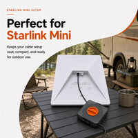 Starlink Mini setup with retractable DC cable reel keeping the cable neat for outdoor use