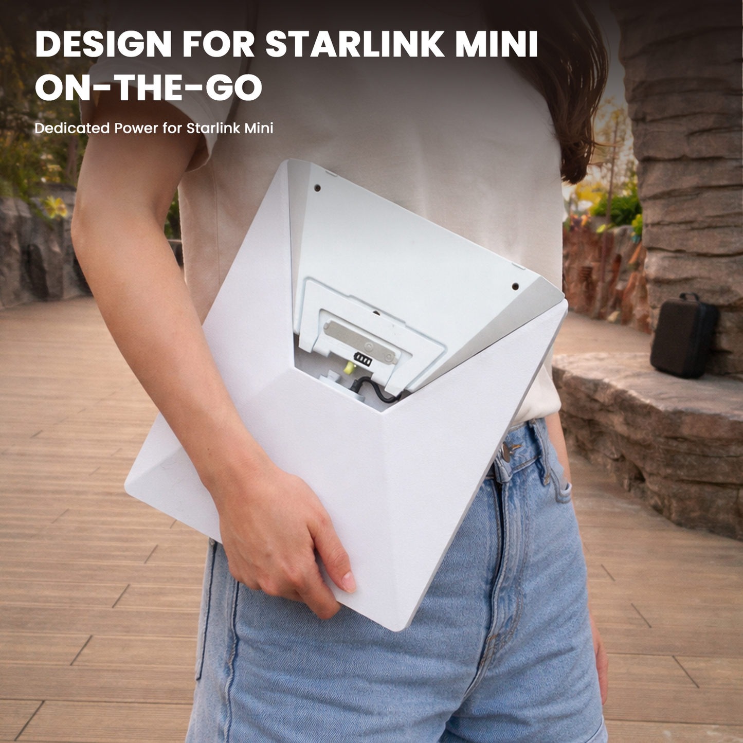 CTmods portable Starlink Mini power bank carried by user for on the go outdoor connectivity